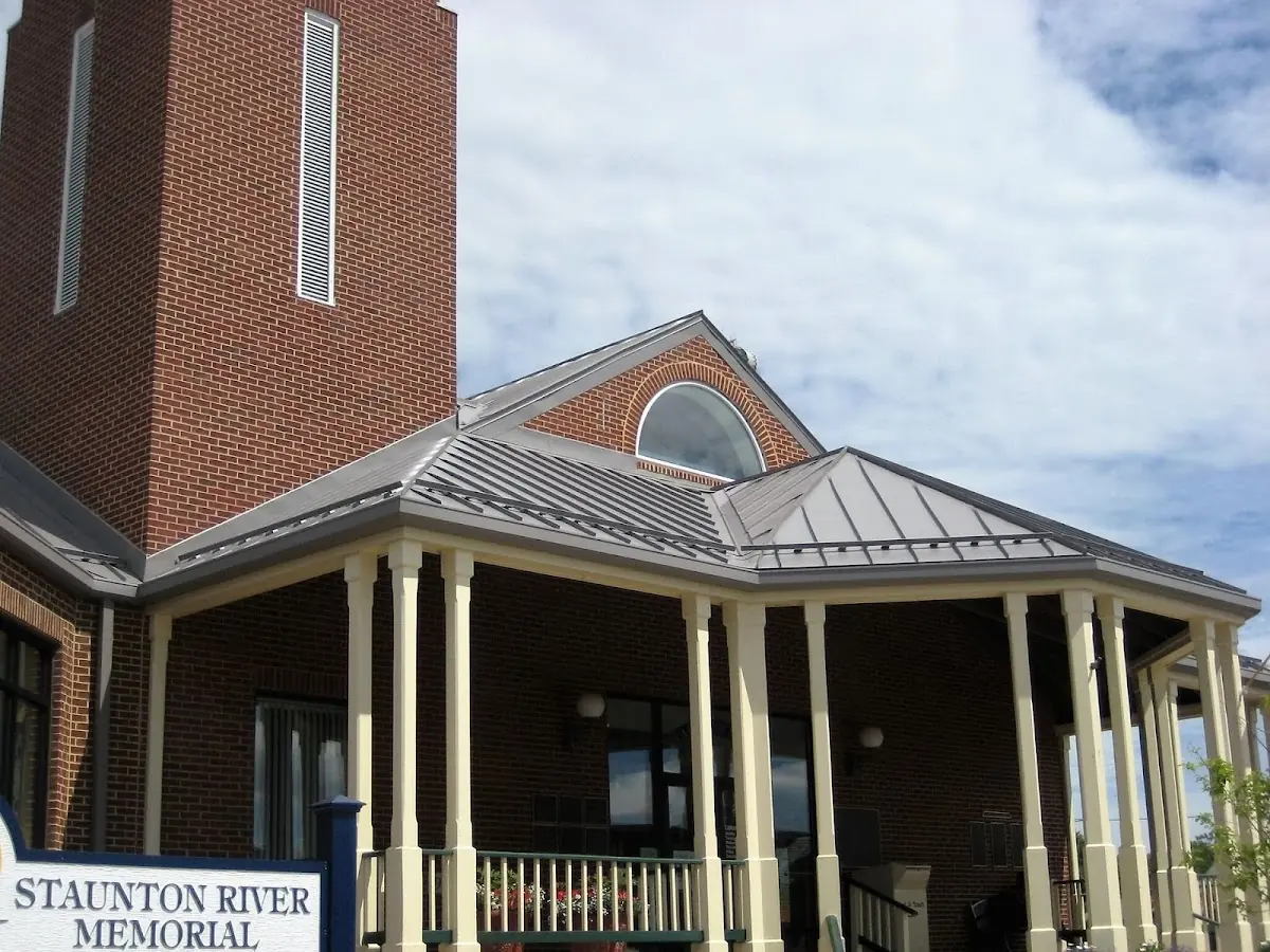 Skilled roofing craftsmen working on a residential roof in Glen Haven